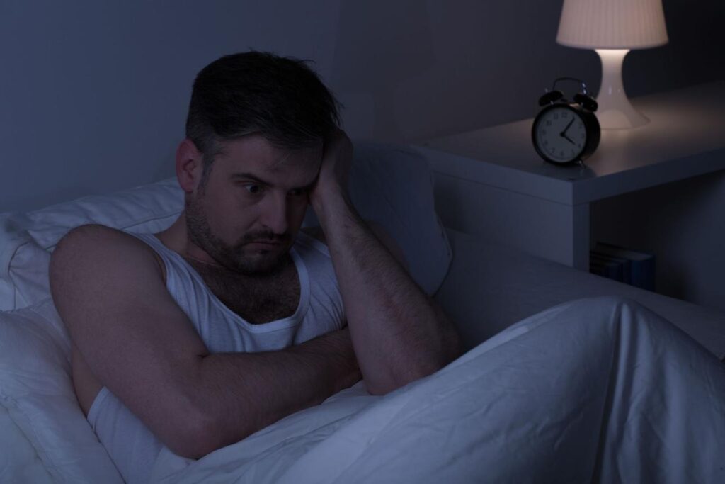 man-worrying-at-night Man worrying at night